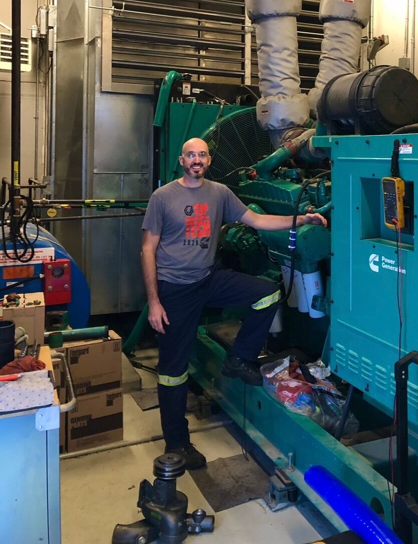 Harvey working on a Cummins Generator
